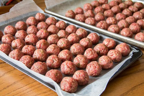 2 baking sheets full of raw beef meatballs... Big batch make-ahead beef meatball recipe