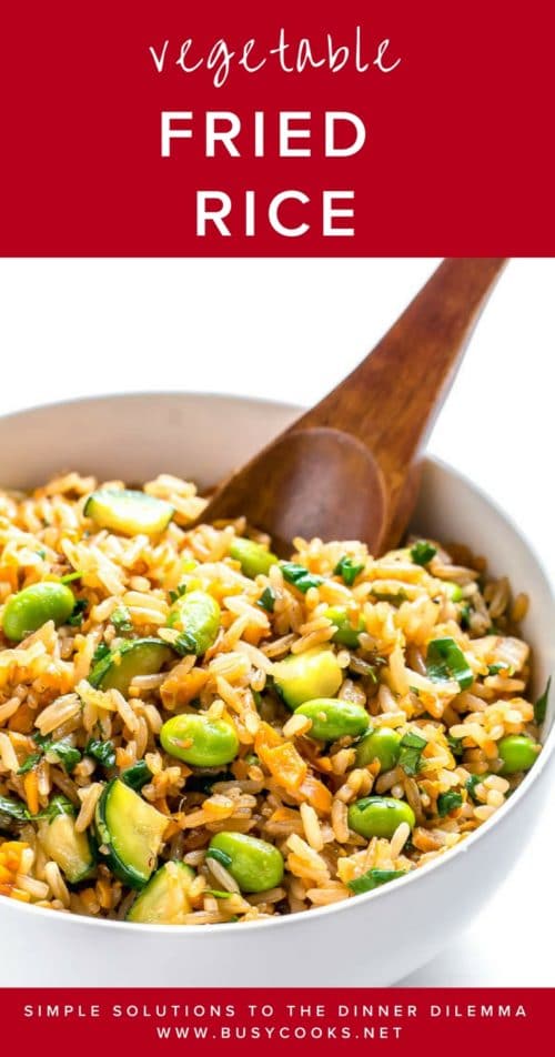 Not your typical fried rice, but you'll be begging for seconds! Packed with colorful fresh vegetables, this easy meatless dinner is seriously satisfying and quick to prepare! #easyfriedrice #vegetablefriedrice #busycooks