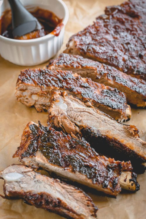 Quick and easy Instant Pot Ribs finished on the grill for a nice char and crispy caramelization. So much flavor in so little time! 1 hour is all you need! #instantpotribs #instantpotrecipes
