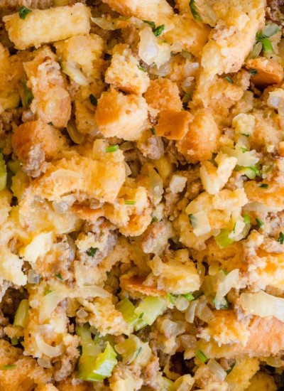 We transformed a classic stuffing recipe into an easy peasy Instant Pot Sausage Stuffing. Generous portions of flavorful fluffy sausage stuffing in less than 1 hour. #instantpotrecipes #instantpot #sausagestuffing #thanksgivingmenu #stuffing 