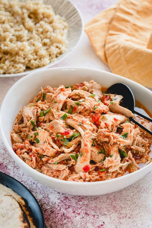 This Instant Pot Salsa Chicken with brown rice might be the EASIEST dinner ever! Basically hands-free, this 3-ingredient one-pot meal comes together in less than an hour, and the Instant Pot does most of the work for you!