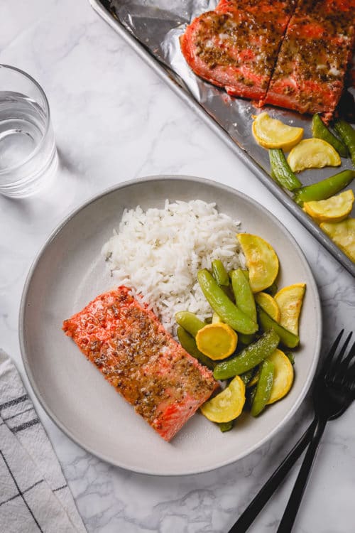 This oven roasted salmon filet with honey mustard glaze is impressive, yet effortless. The best 30-minute one sheetpan dinner!!