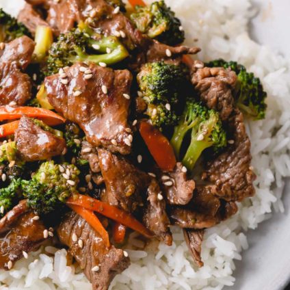 Beef and broccoli stir fry over white rice.