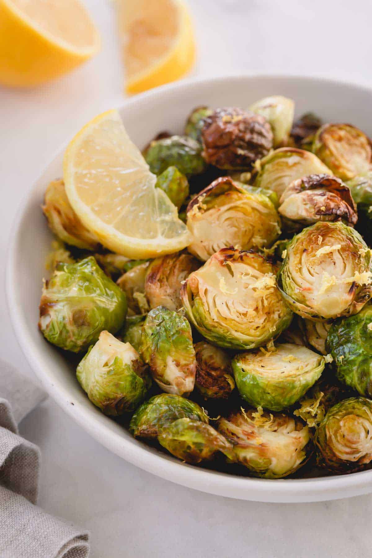 A bowl of roasted lemon brussels sprouts.